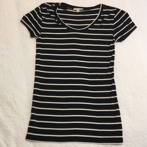 Black and white stripes make an impression on this soft tee